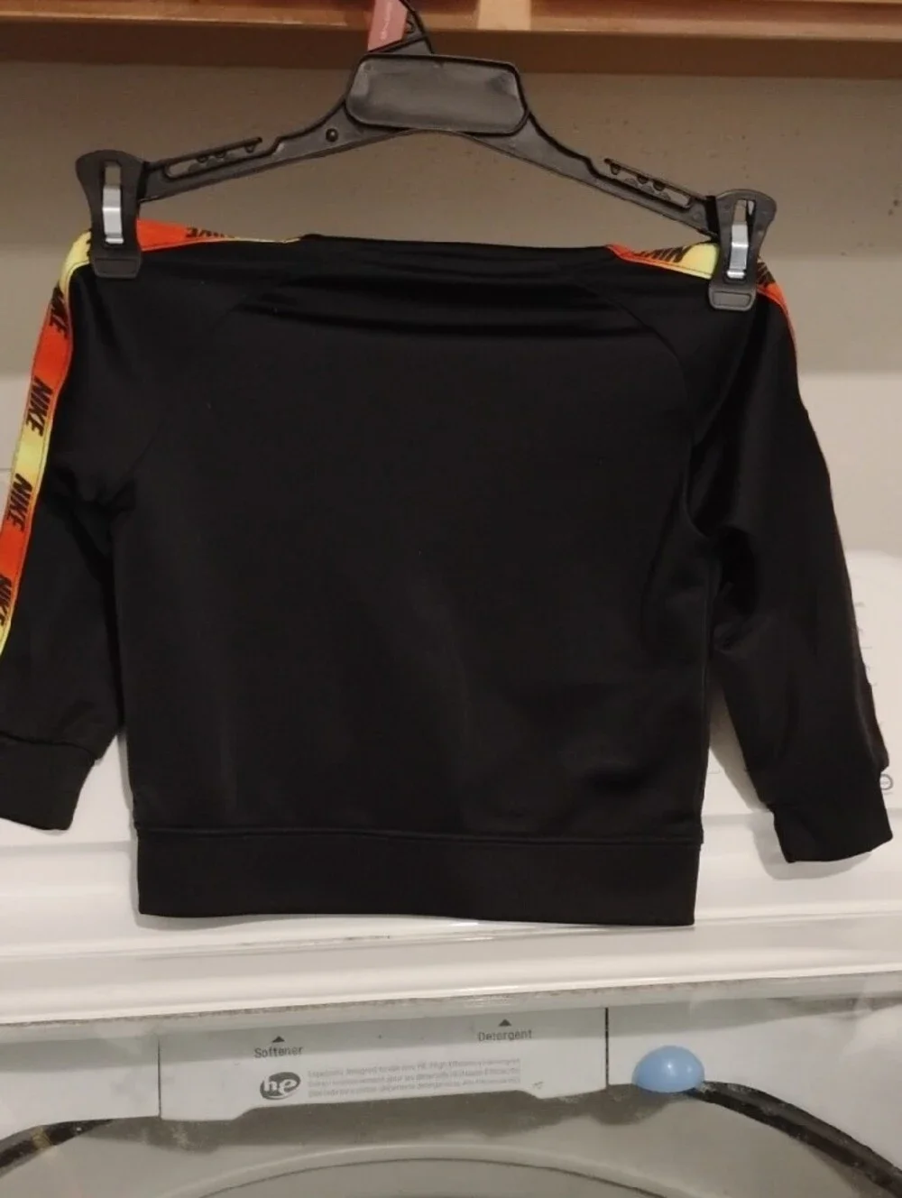 Nike Black Kids Track Jacket with Orange and Yellow Stripe
